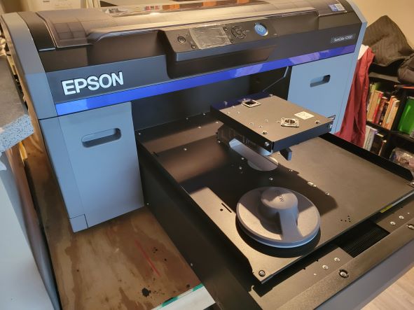 Equipment Lot: EPSON SureColor F2100 DTG / Direct to Garment Printer & Lawson Zoom-AE DTG Pre-Treat Machine (Used) Item # UE-111522B