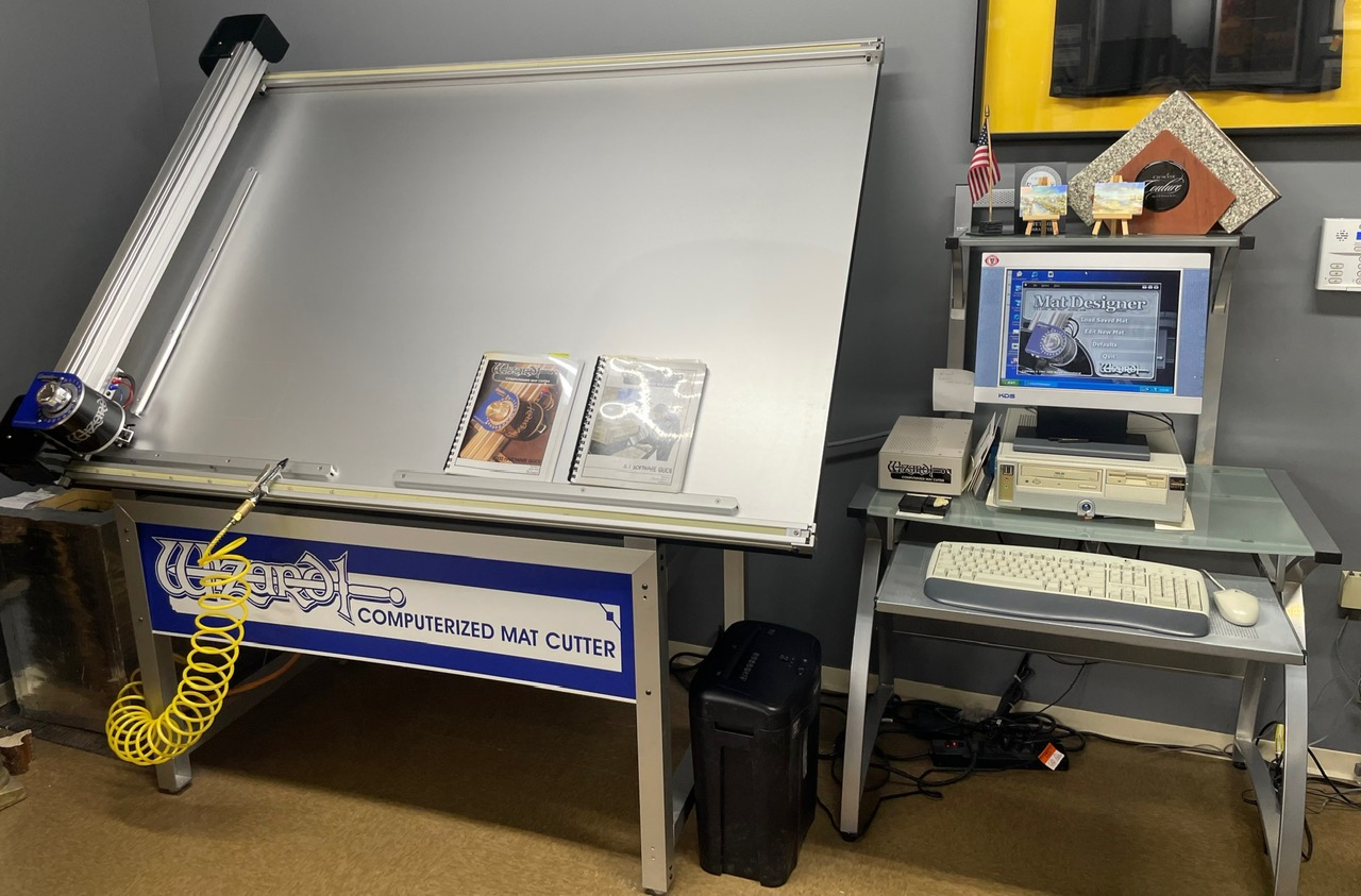 Equipment Lot: Wizard 8000 CMC Computerized Mat Cutter, Bienfang Masterpiece 550 Dry Mount Heat Press, Jyden Chopper w/ 5 ft Extension, & Neon Picture Framing Store Sign (Used) Item # UE-020623B