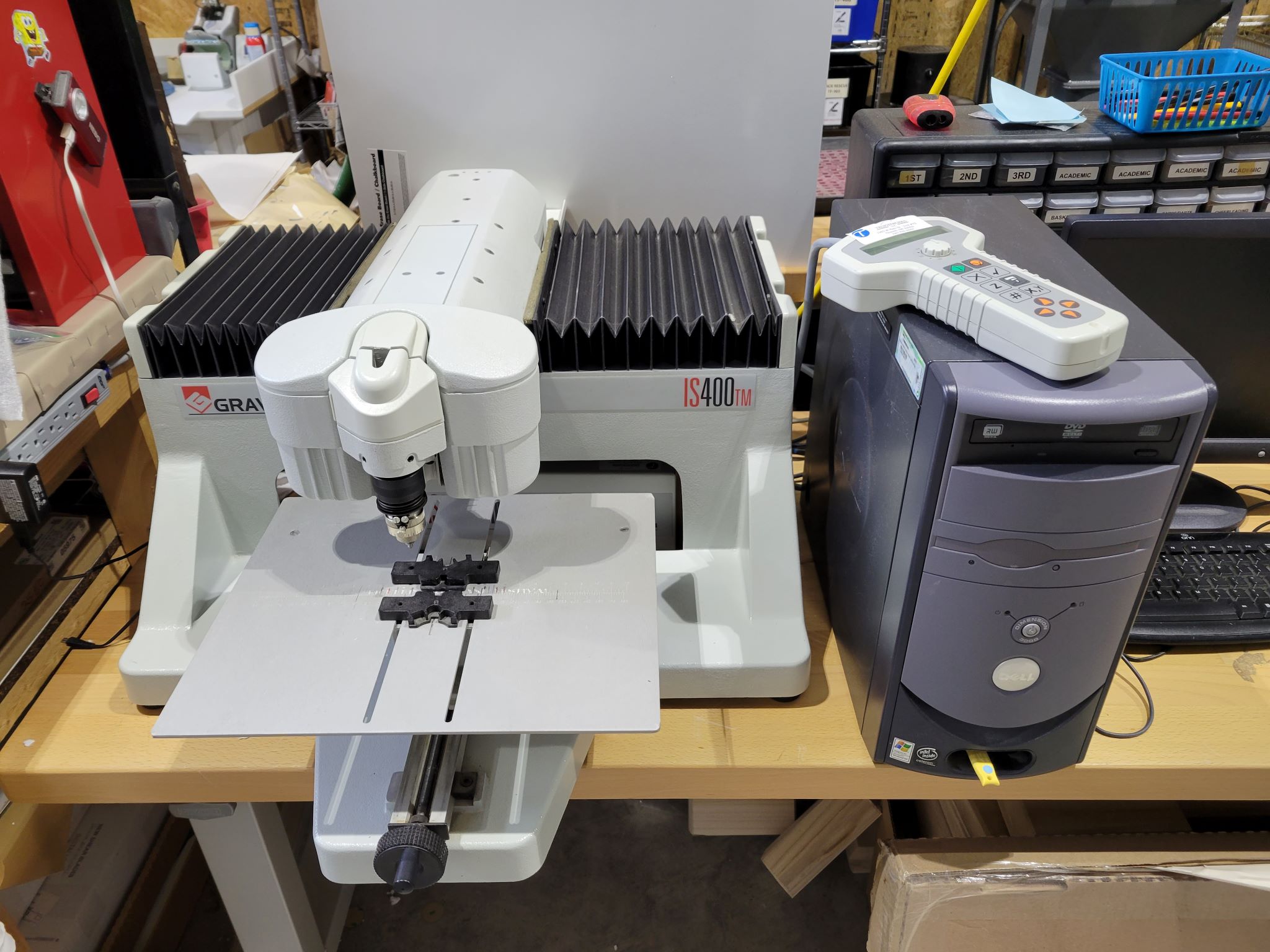 Equipment Lot: Gravograph IS400 Trophy Master Rotary Engraving Machine & GCC Jaguar V LX 24″ Vinyl Cutter Plotter (Used) Item # UE-020124B