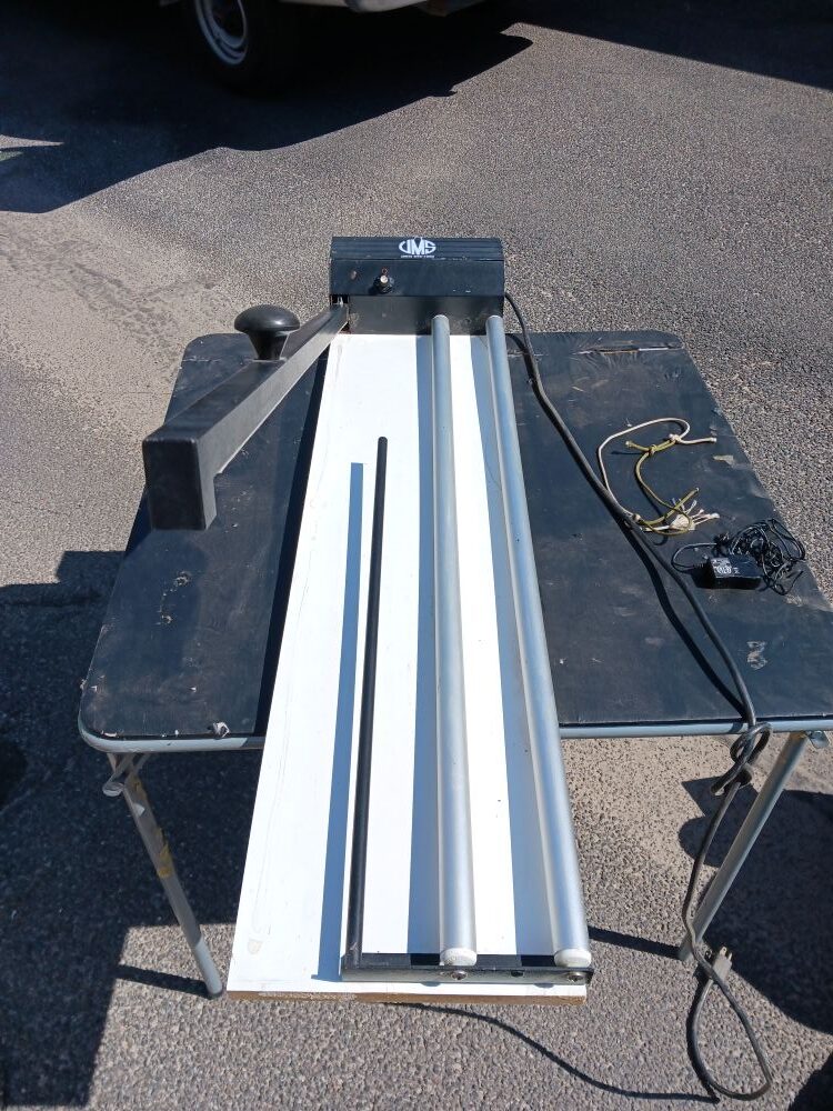 Framing Equipment Lot: Fletcher C&H Mat Cutter, UMS Shrink Wrapper (Used) Item # UE-062725G